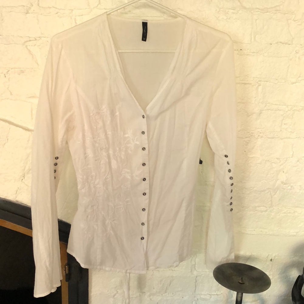 White blouse with embroidered flowers